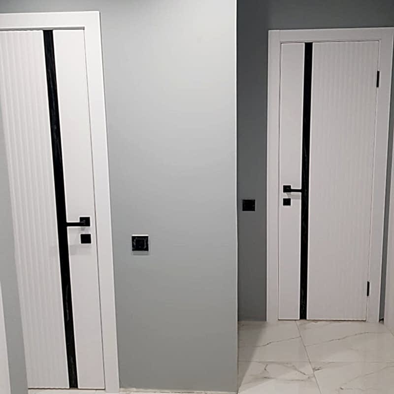 Двери межкомнатные Атлант белые в интерьере